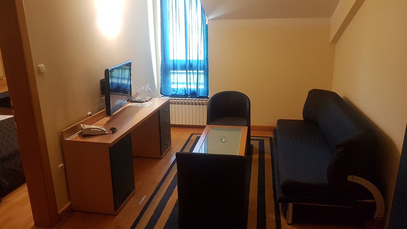Living room — desk, TV and sofa-bed